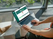 mockuuups-free-macbook-pro-with-female-professional